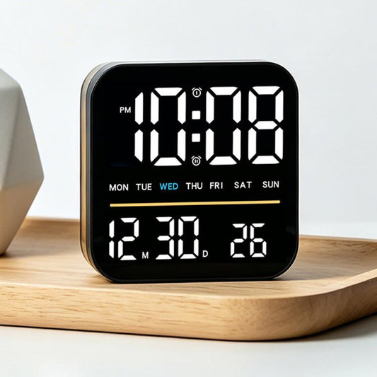 Black digital alarm clock with white LED time and date display
