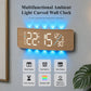 Curved digital LED wall clock with wood frame, blue backlight and feature icons shown below.