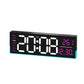Black LED digital clock with purple segmented time, weekday, temperature and date
