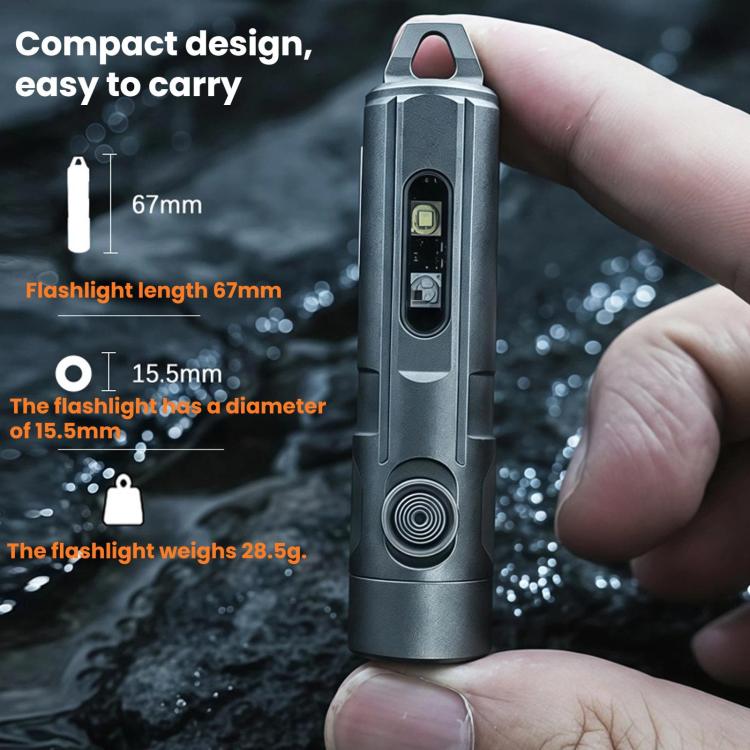 Compact gray flashlight keychain with top loop and front circular speaker-like grille