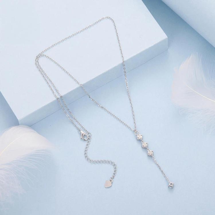 Y-shaped long chain necklace with dangling four-leaf clover crystal charms