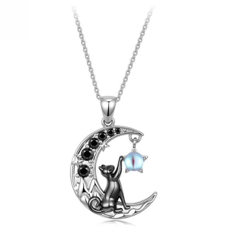 Silver-tone moon cat pendant necklace with round frame and blue accent stone
