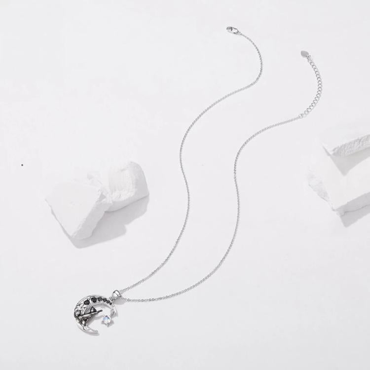Silver-tone moon-cat pendant necklace with round disc pendant and long chain