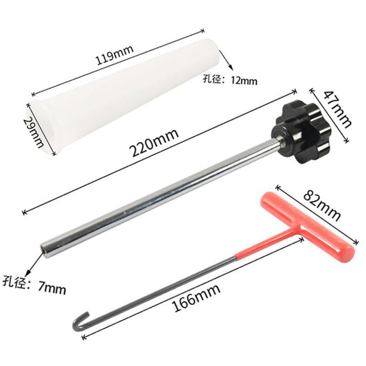 Valve stem tool with long metal rod and red handle, plus spare white plastic guide