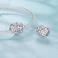 Heart-shaped charm bead with pink stones on a silver-tone bracelet chain