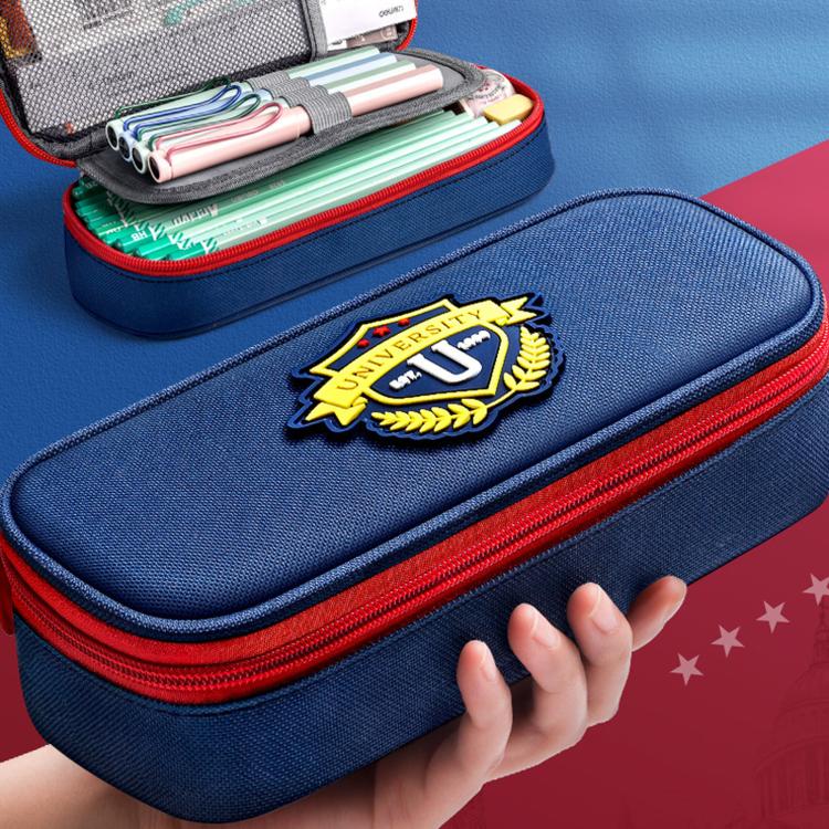 Navy-blue pencil pouch with red zipper and crest patch, open top shows compartments