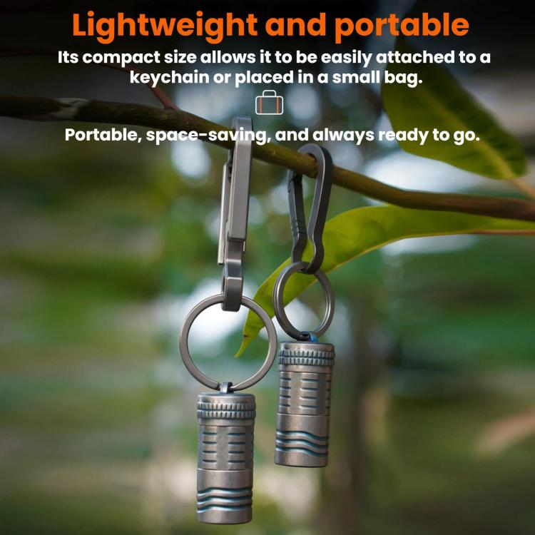 Mini rechargeable LED keychain flashlight with metal clip and keyring attachment