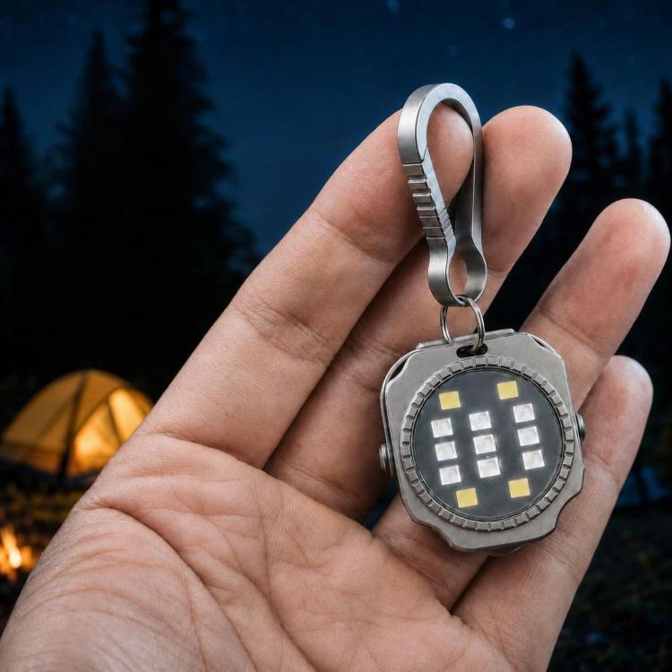 Titanium mini keychain flashlight with round LED panel and metal loop ring