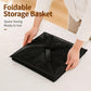 Foldable black mesh laundry storage basket with side handles, collapsed flat