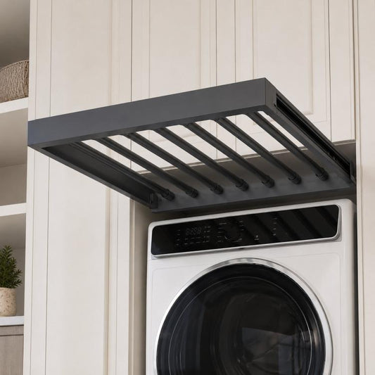 Extendable laundry drying rack in dark gray with 7 rods mounted on top of a washer