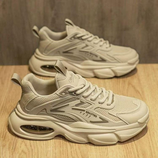 Beige cushioned lace-up sneakers, front and side profile with air-cushion sole