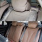 Mercedes-Benz rear seat belt guide cover installed on tan leather seat