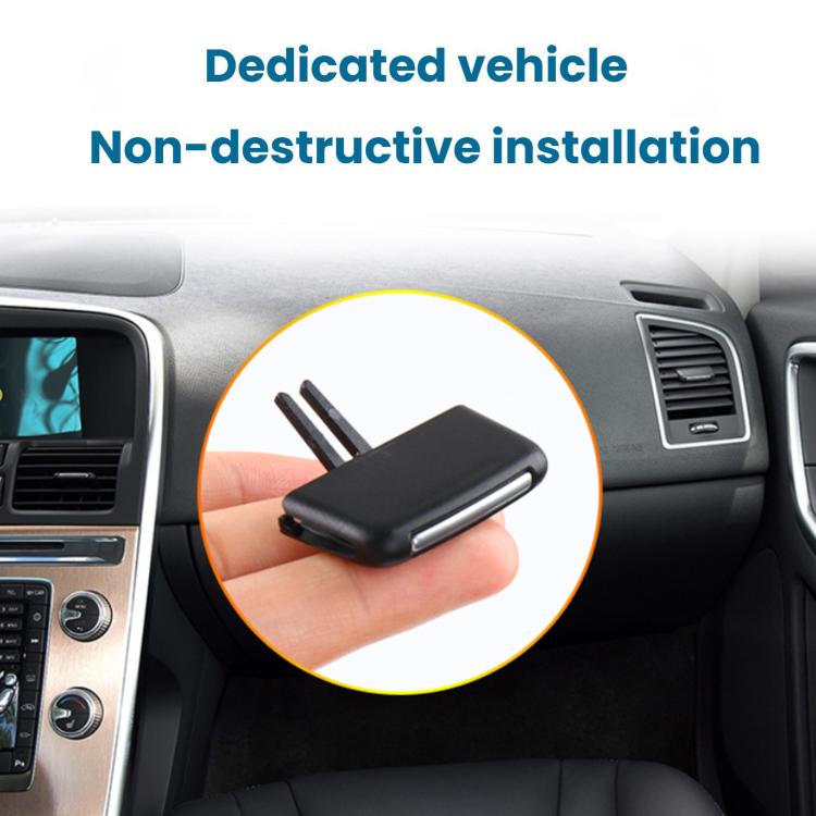 Air conditioning vent adjustment paddle on hand near dashboard vent, matte black