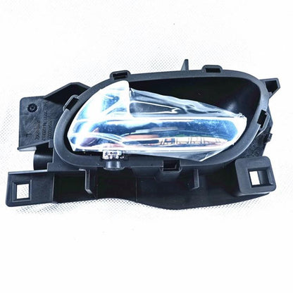 Car interior door handle assembly with black bezel and chrome lens
