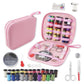 Pink zipper sewing kit case open with multicolor thread spools, needles, scissors, pins