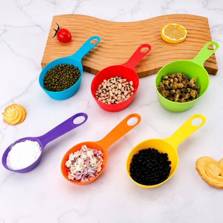 Rainbow plastic measuring spoons set with hanging loops, multicolor scoops