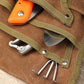 Waist bag tool loops and metal hooks on waxed canvas, with snap-secured straps