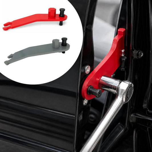Red and black door calibration tool set against a car door panel edge