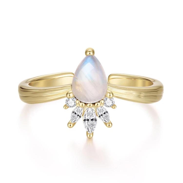 Gold-tone adjustable open ring with teardrop moonstone center and crystal crown