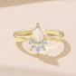 Gold-tone open adjustable ring with pear-shaped moonstone and crystal drops