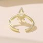 Back view of gold-tone adjustable open ring with teardrop moonstone top setting