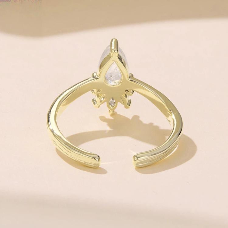 Back view of gold-tone adjustable open ring with teardrop moonstone top setting
