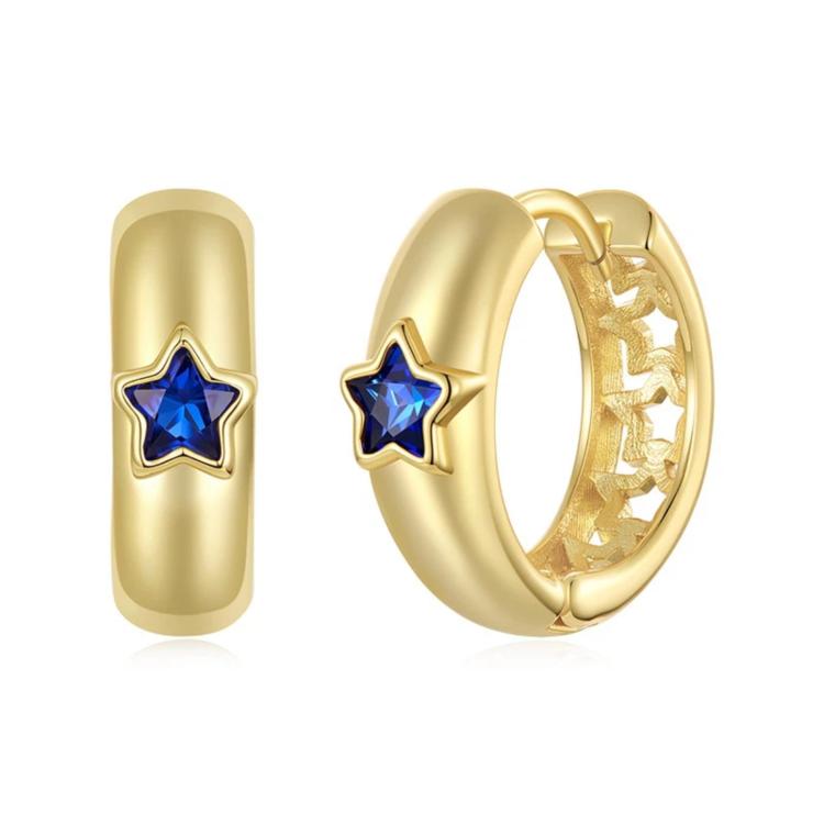 Gold-tone hoop earrings with blue star enamel detail