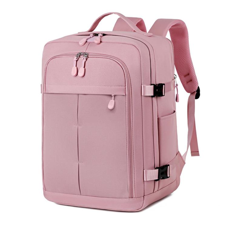 Pink travel backpack with front zip pocket, top handle, and adjustable shoulder straps