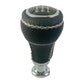 Black leather-look gear shift knob with stitched cross panel and chrome stem