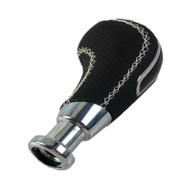 Black gear shift knob with perforated grip, contrast stitched seams, shiny chrome base