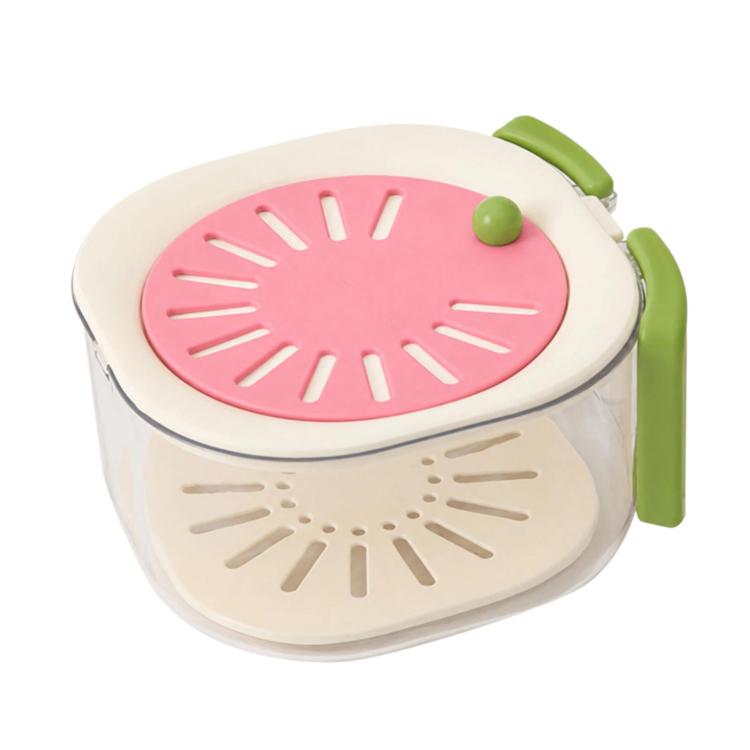 Pink vented lid collapsible colander basket with green side grips and clear body