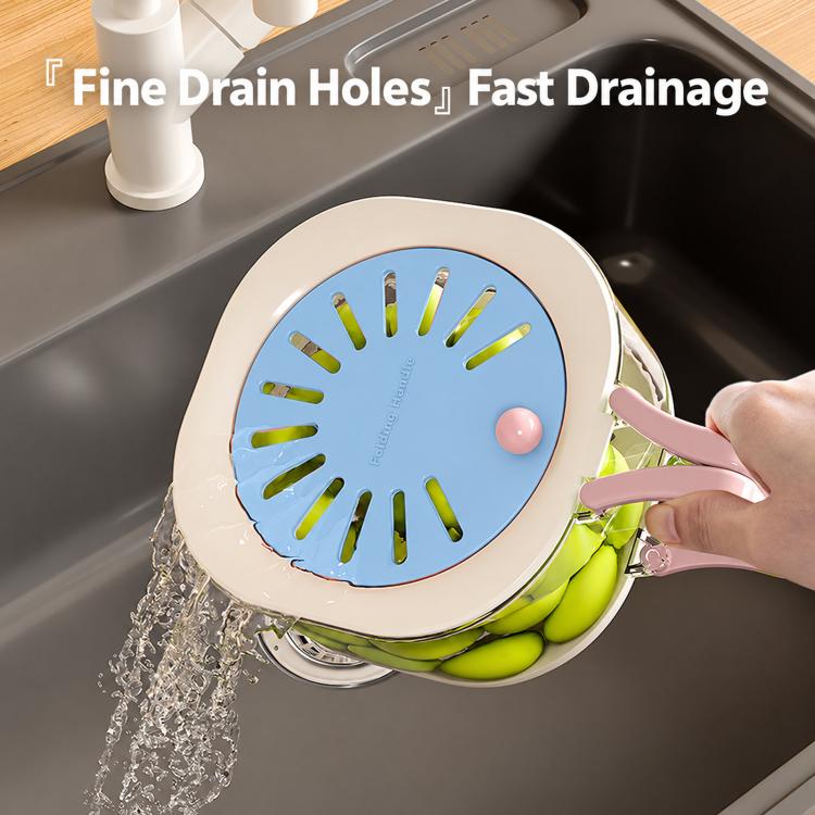 Blue vented colander basket over sink, draining with pink handle and green produce