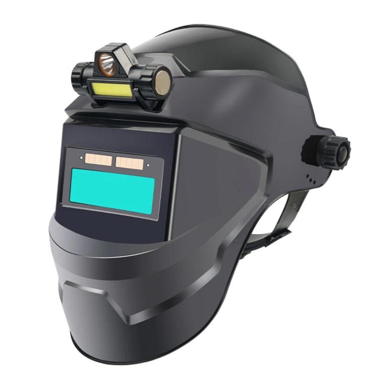 Dark gray auto-darkening welding helmet with blue viewing window and integrated headlamp.