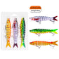 Three jointed swimbait fishing lures with treble hooks in a clear blister pack