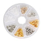 Round compartment organizer with mixed earring backs in gold, silver, and clear