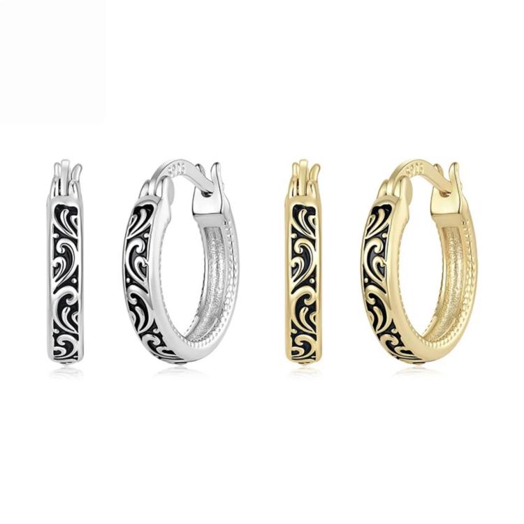 Set of silver- and gold-tone hoop earrings with vintage scroll pattern