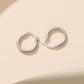 Silver-tone hoop earring backs with hinged clasp and small post detail