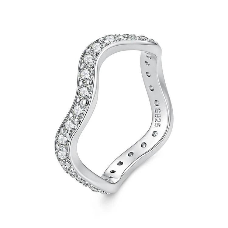 Front view of a wave-style moissanite ring in polished sterling silver with halo stones