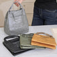 Insulated lunch tote bags in gray, black, and ginger yellow displayed together