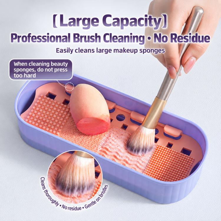 Purple makeup brush cleaning box with orange insert holding brushes during washing
