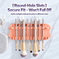 Orange insert makeup brush drying rack with round-hole slots holding multiple brushes