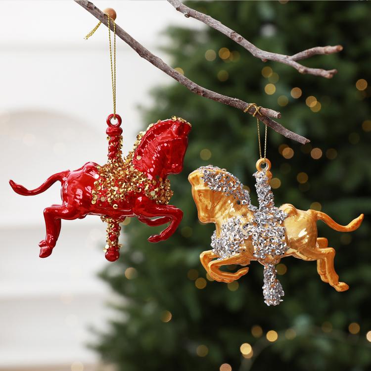 Red and gold glitter rocking horse ornaments with hanging loops