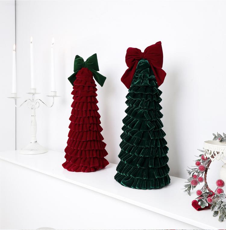Set of two tiered fabric Christmas tree ornaments on display, dark red and dark green