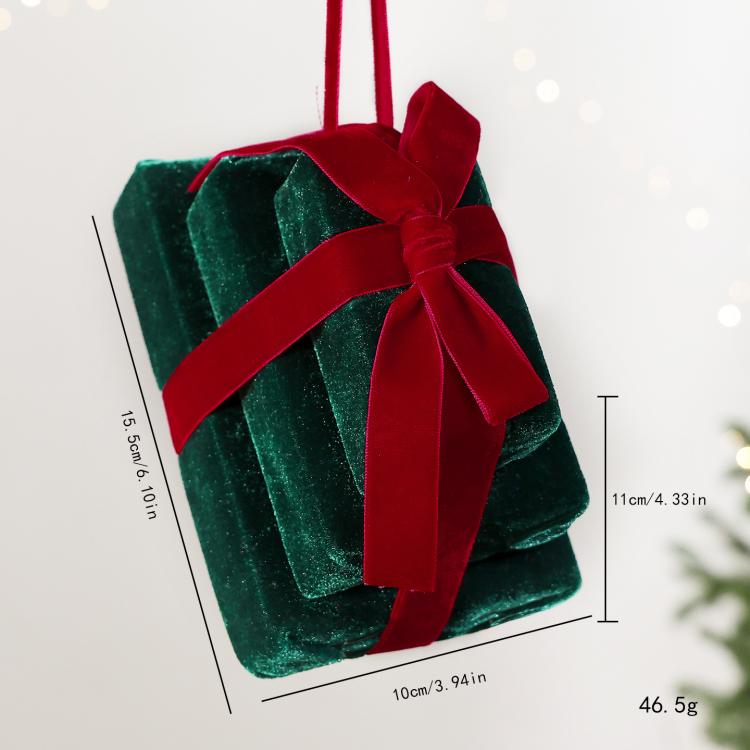 Velvet gift box hanging ornament in dark green with wine red ribbon bow.
