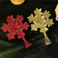 Glitter red and gold snowflake tree toppers with spiral metal stems