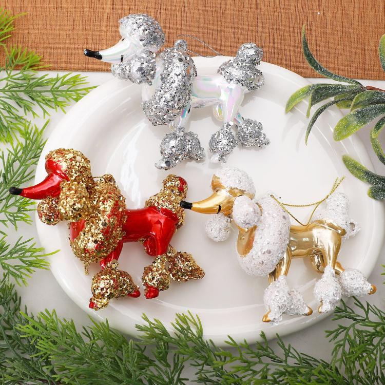 Assorted poodle Christmas ornaments: red and gold, plus white and silver sequined