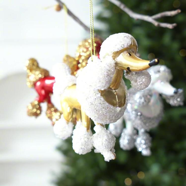 White and silver sequined poodle ornament closeup with loop hanger