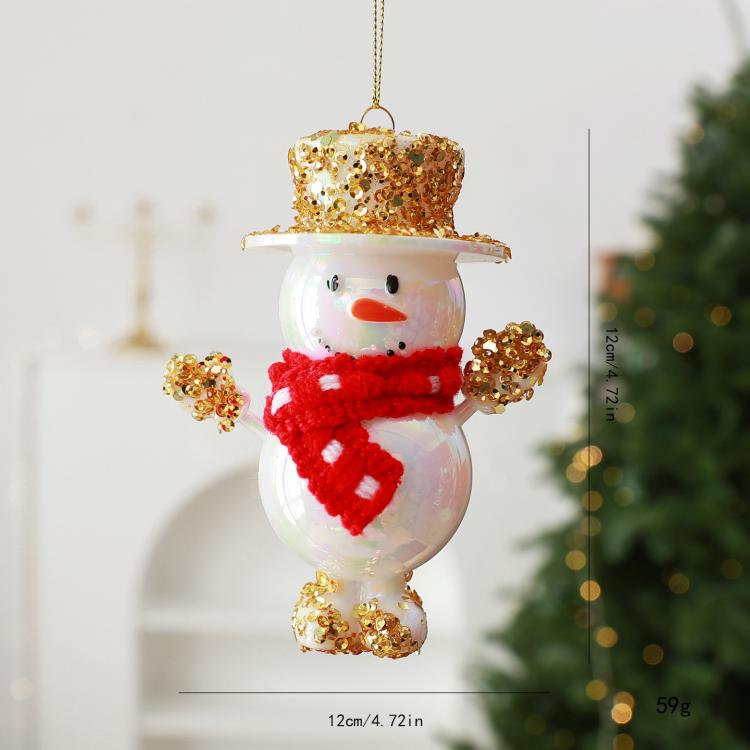 White snowman ornament with gold glitter top hat, red scarf, and hanging loop