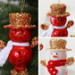 Two snowman ornaments: red one and white one with gold glitter top hats