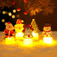 Five LED Christmas character candle lights glowing in snowy display on tray